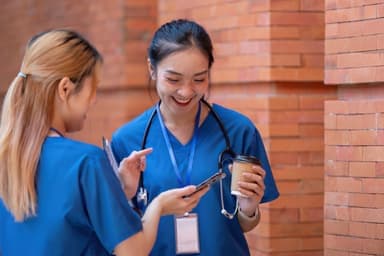 Medical assistant student practicing blood pressure measurement