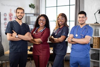 Healthcare students discussing medical cases in classroom